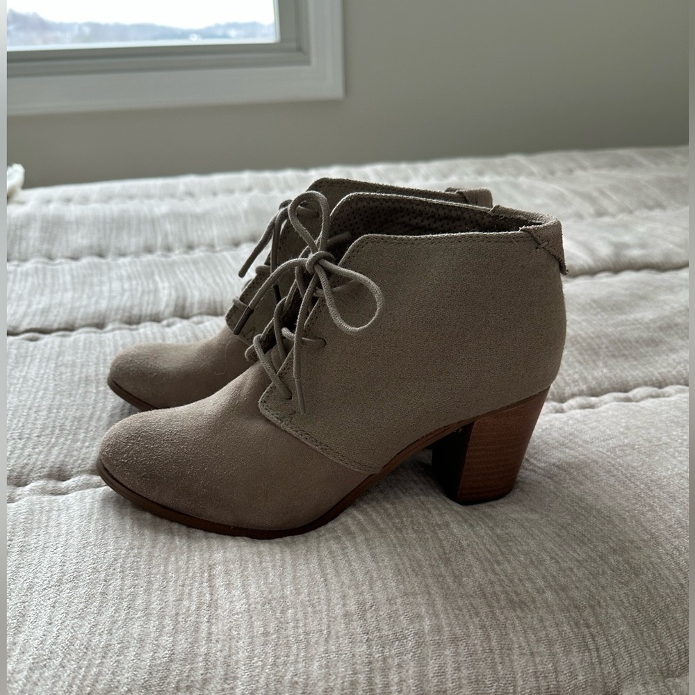 Tom’s brown booties
